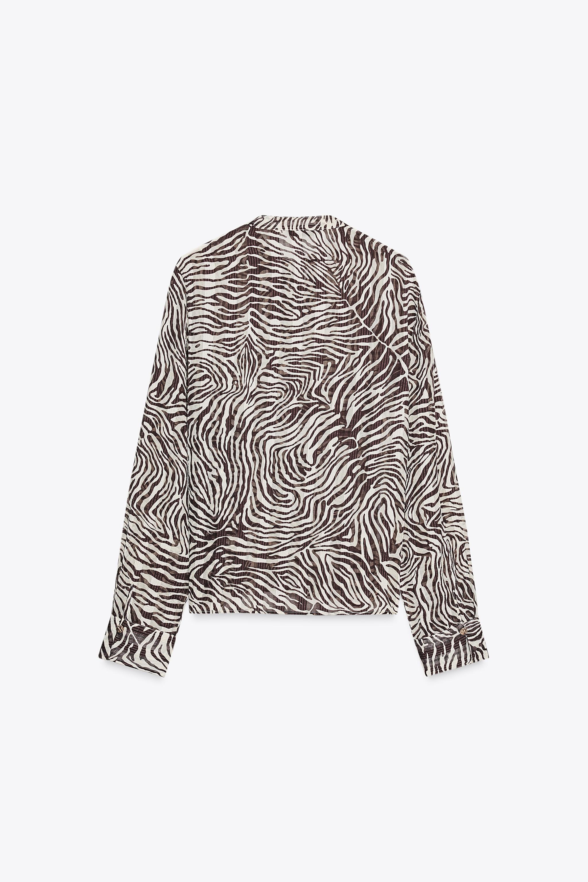 ANIMAL PRINT BOW BLOUSE